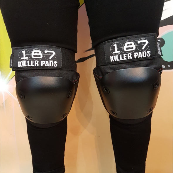 person wearing 187 black knee pads 