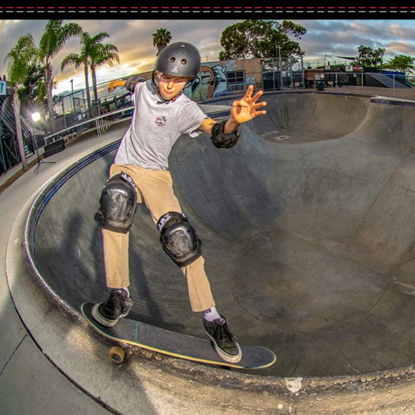 boy skateboarding wearing 187 killer pads knee pads and elbow pads 