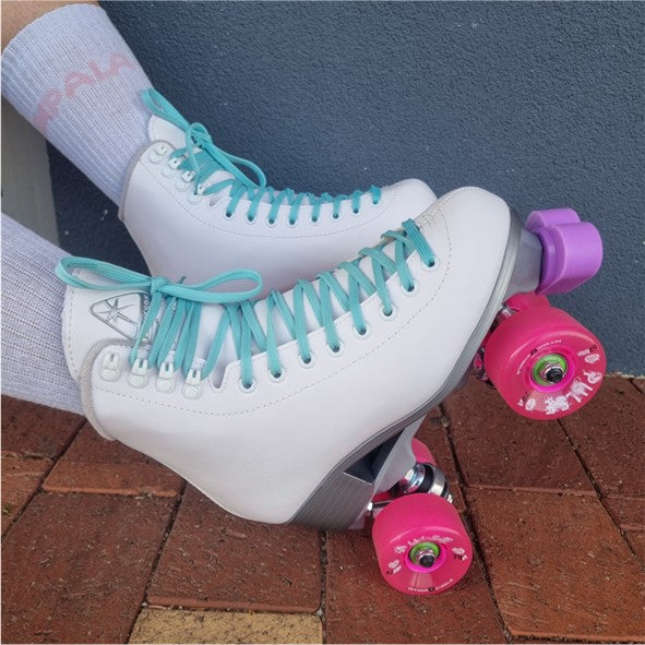 pink outdoor skate wheels on white high top boot