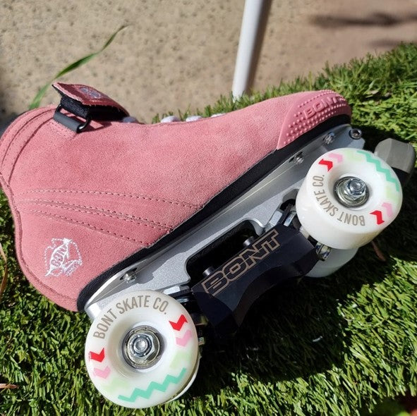 pastel pink bont parkstar roller skate with bont grind block and white wheels 