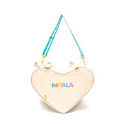 cream heart shaped rollerskate bag