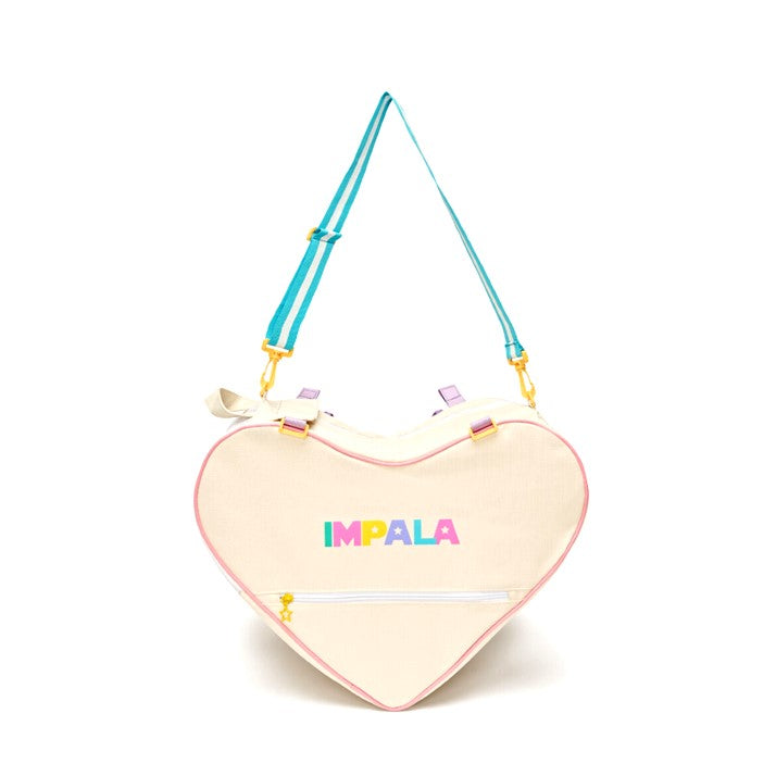 cream heart shaped rollerskate bag