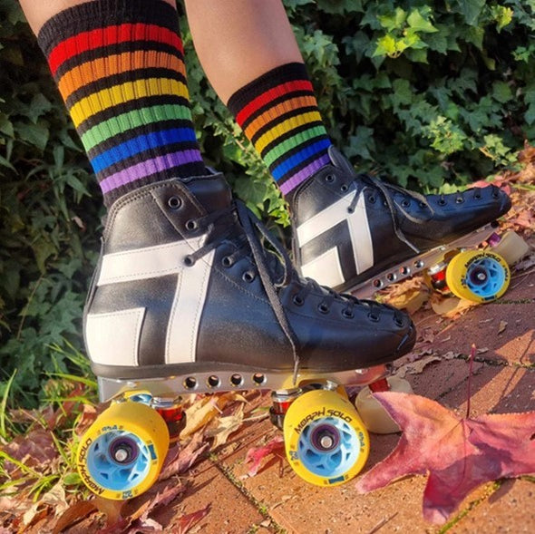 black mid calf socks with rainbow sripes and rollerskates