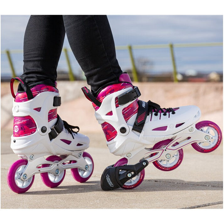 KID WEARING WHITE PURPLE INLINE SKATES