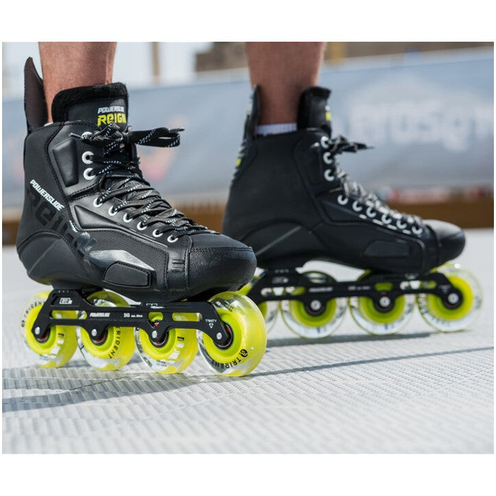 person wearing powerslide reign black yellow hockey inline skates