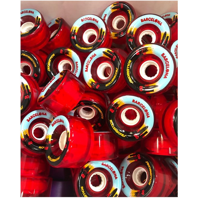 pile of red clear roller skate wheels