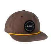 BROWN CAP WITH YELLOW TRIM AND S1 LOGO AT FRONT