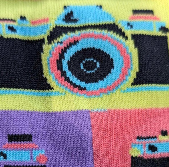 CLOSE UP OF MULTI-COLOUR BLOCK PATTERN WITH CAMERA PATTERN CREW SOCKS