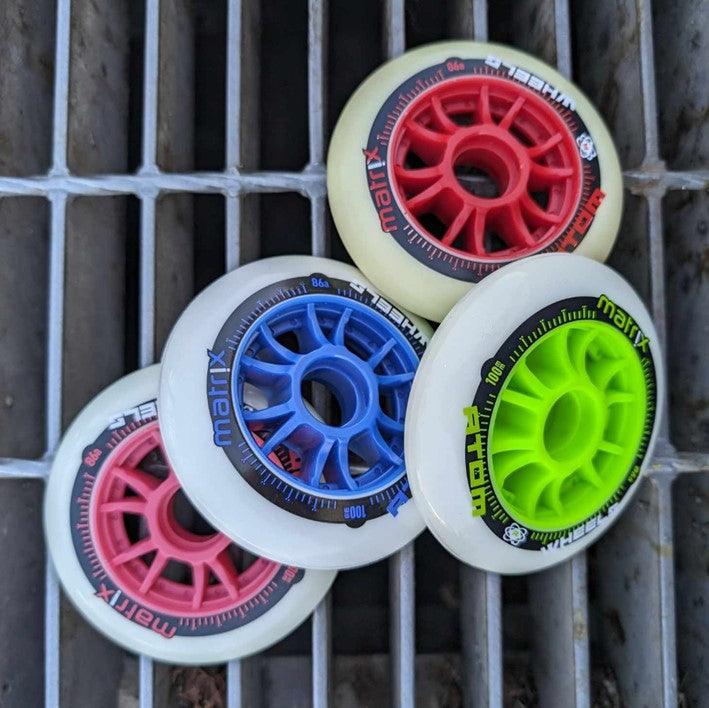 blue red green pink inline wheels 