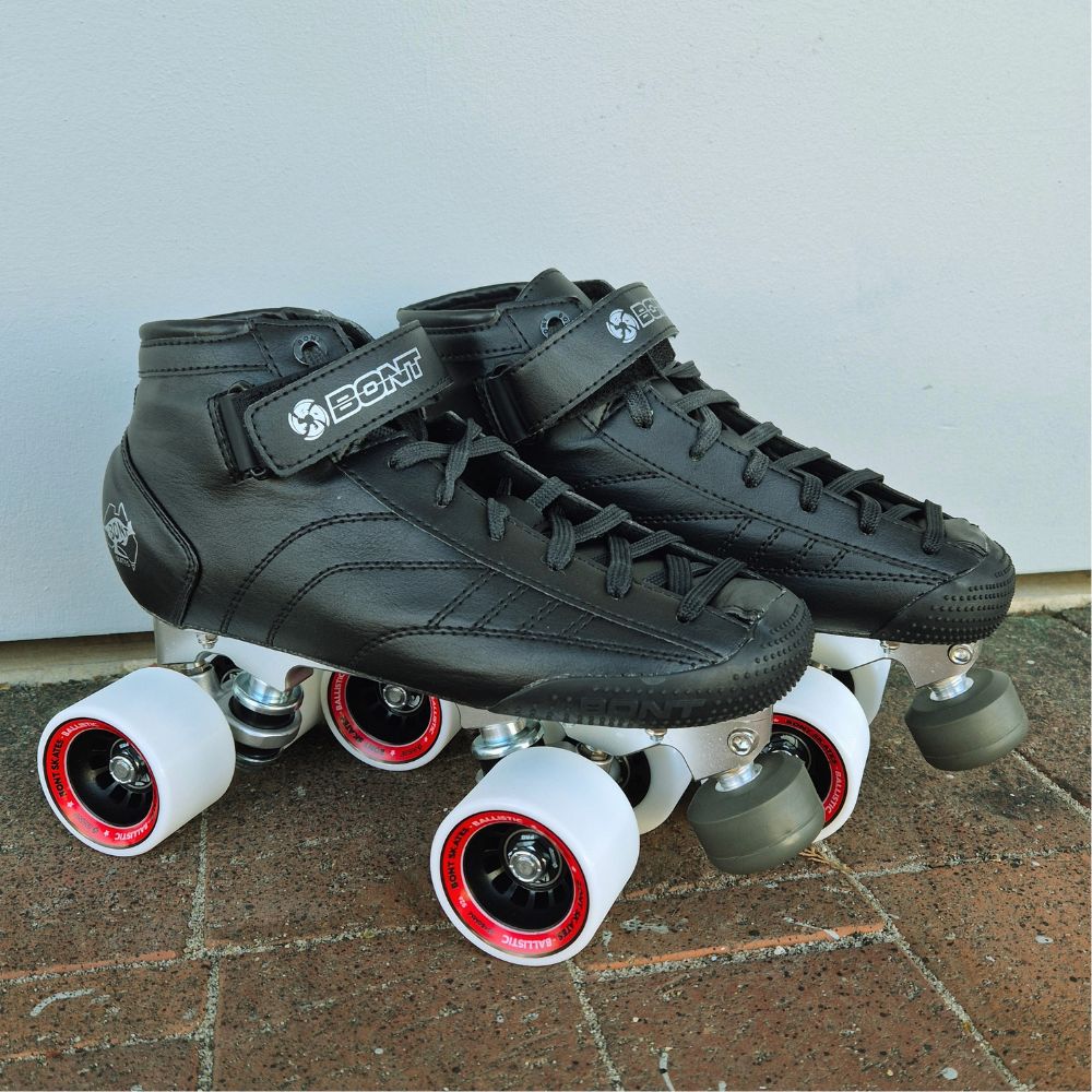 Bont Prostar Black Mid Cut roller skates with white indoor ballistic 92a indoor wheels, black tracer plate and adjustable toe stop - Lucky Skates 