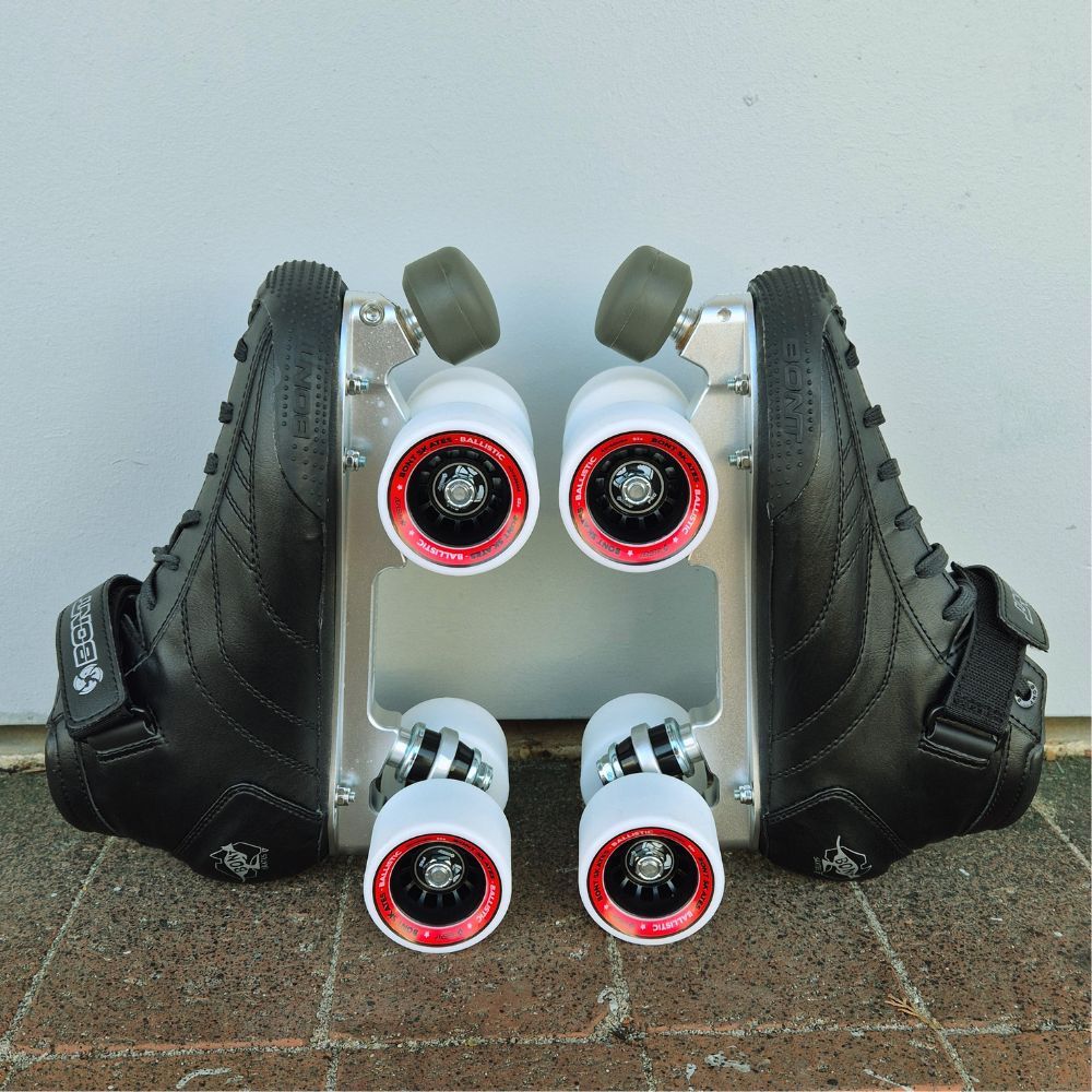 Bont Prostar Black Mid Cut roller skates with white indoor ballistic 92a indoor wheels, black tracer plate and adjustable toe stop - Lucky Skates 