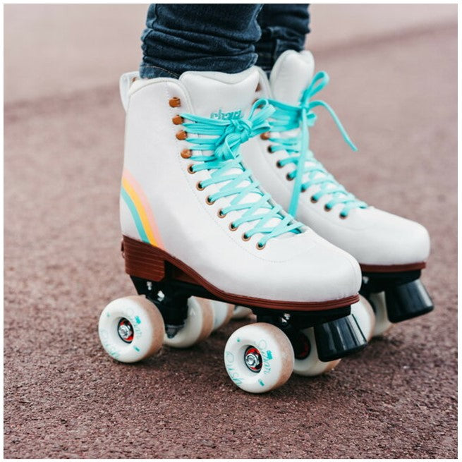 person wearing chaya white pearl high top adjustable kids skate