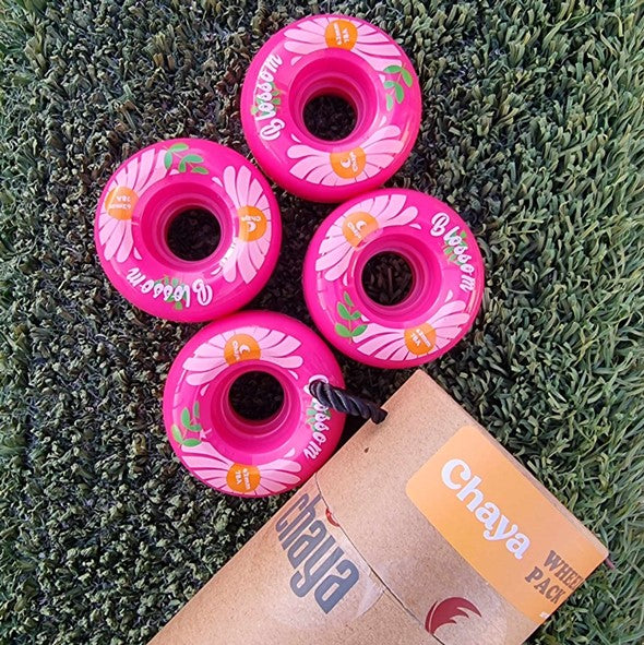 4 outdoor pink rollerskate wheels with flower print