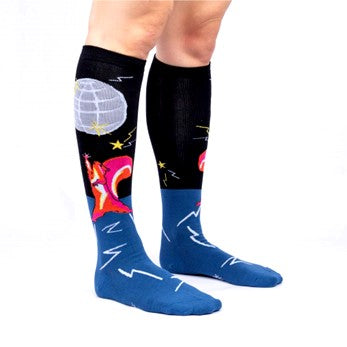 PERSON WEARING KNEE HIGH SOCKS BLACK AND BLUE WITH ROCKSTAR SQUIRREL AND DISCO BALL