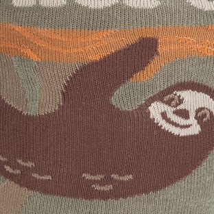 CLOSE UP OF HAPPY SLOTH HANGING FROM BRANCH ON SOCK