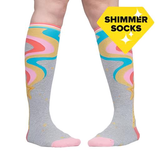 PERSON WEARING GREY KNEE HIGH SOCKS WITH PINK GOLD AND BLUE WAVY STRIPES DOWN SIDE