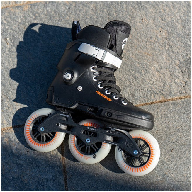 black tri inline skates with orange 