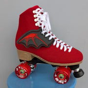 red black bat wings attached to blue rollerkskate 