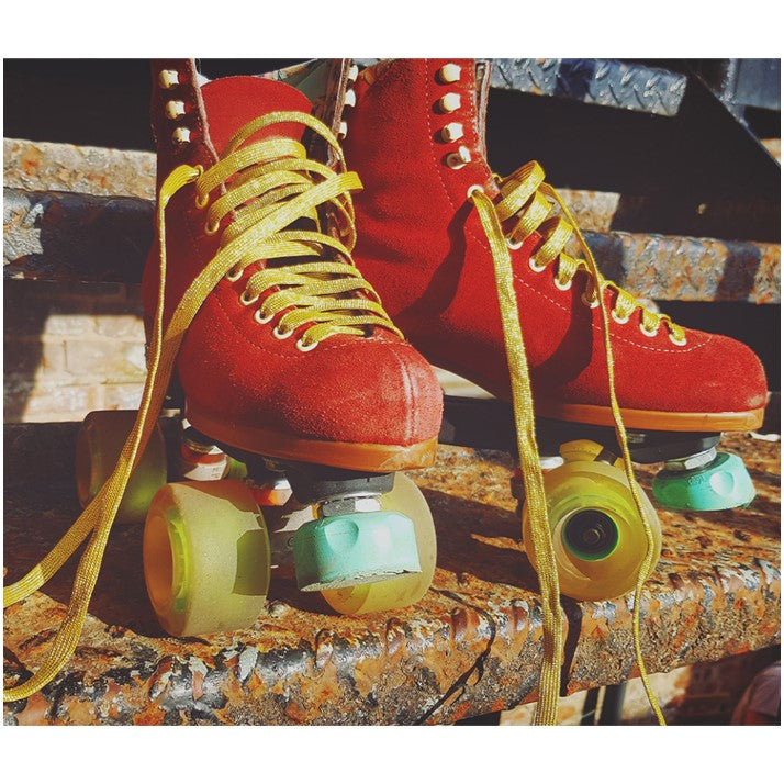 red skate with gold glitter laces 