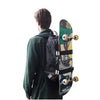 male wearing a 187 killer pads camo skateboard backpack  with skatboard strap on the outside