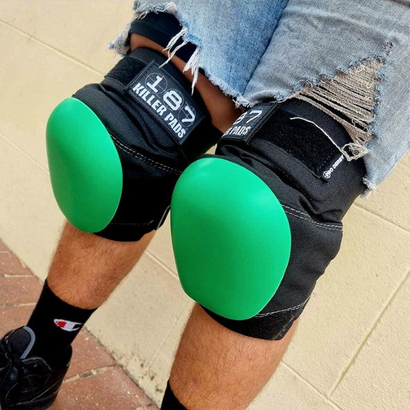 person wearing knee pads with green coloured 187 recaps