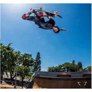 skateboarder jumping wearing 187 padding