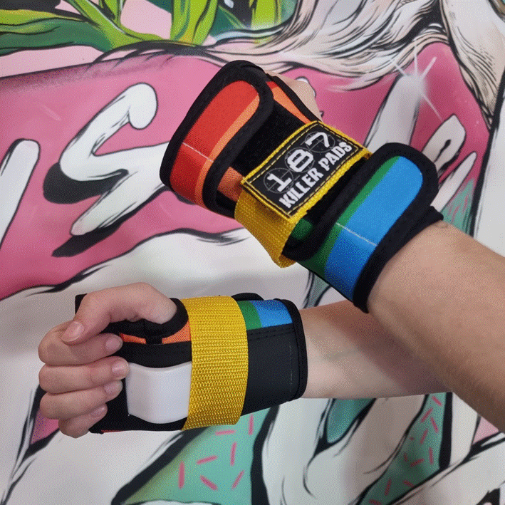 person wearing 187 rainbow wrist guards