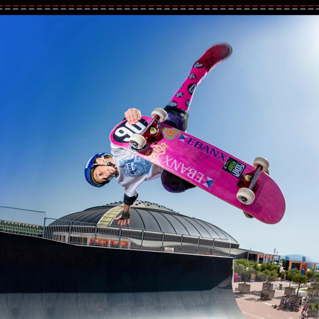 skateboarder jumping wearing 187 killer pads