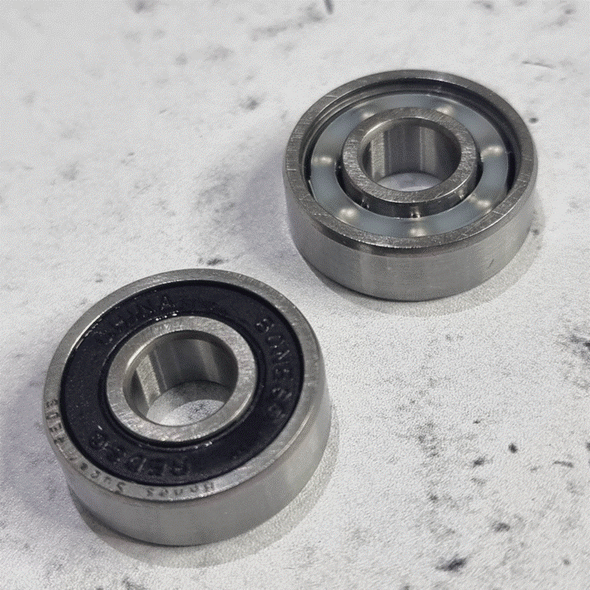 front and back of black shielded bearing