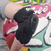 person wearing bont black elbow pads