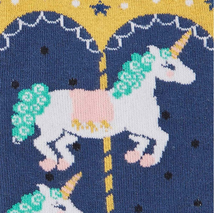 CLOSE UP OF DARK BLUE CREW SOCKS WITH UNICORN CAROUSEL PATTERN