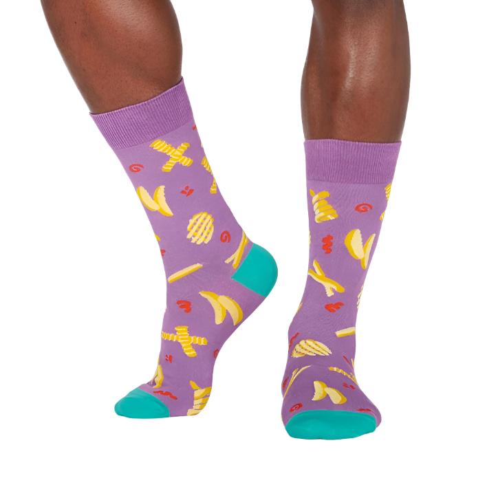 PERSON WEARING PURPLE CREW SOCKS WITH PATTERN OF HOT CHIPS