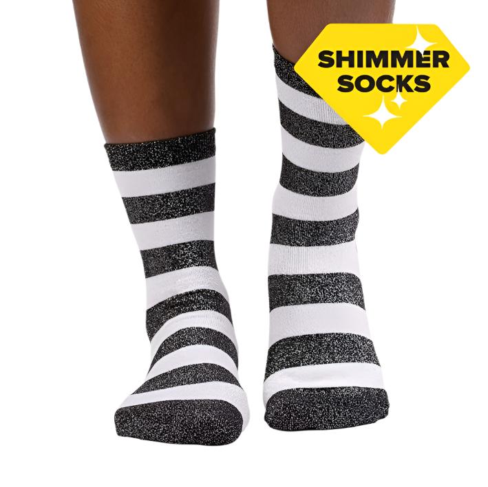 PERSON WEARING WHITE AND BLACK GLITTER STRIPE CREW SOCK