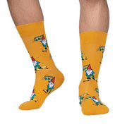 PERSON WEARING MUSTARD YELLOW CREW SOCKS WITH PATTERN OF GNOME SKATEBOARDING WITH BOOMBOX