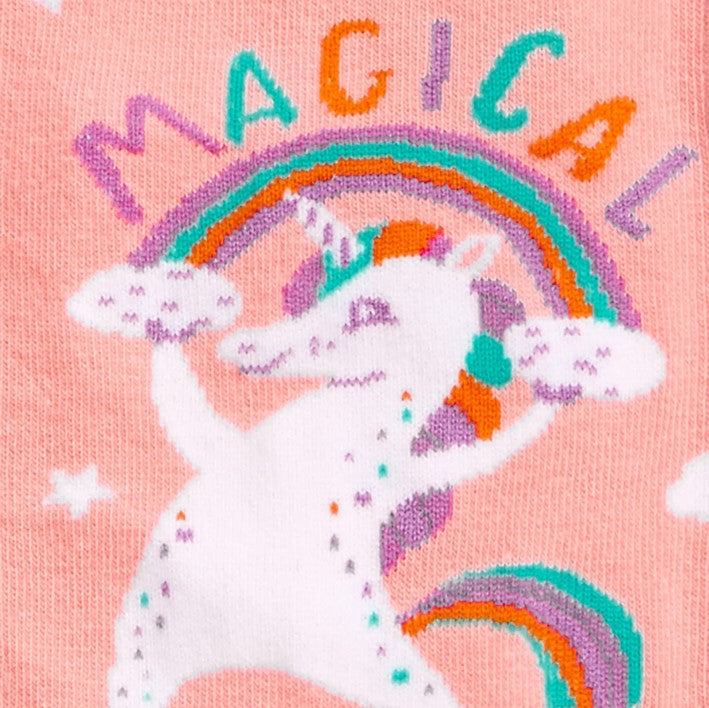 CLOSE UP OF PEACH COLOUR CREW SOCKS WITH PURPLE TOE, HEEL AND CUFF WITH PATTERN OF CLOUDS AND PICTURE OF UNICORN AND TEXT "MAGICAL"