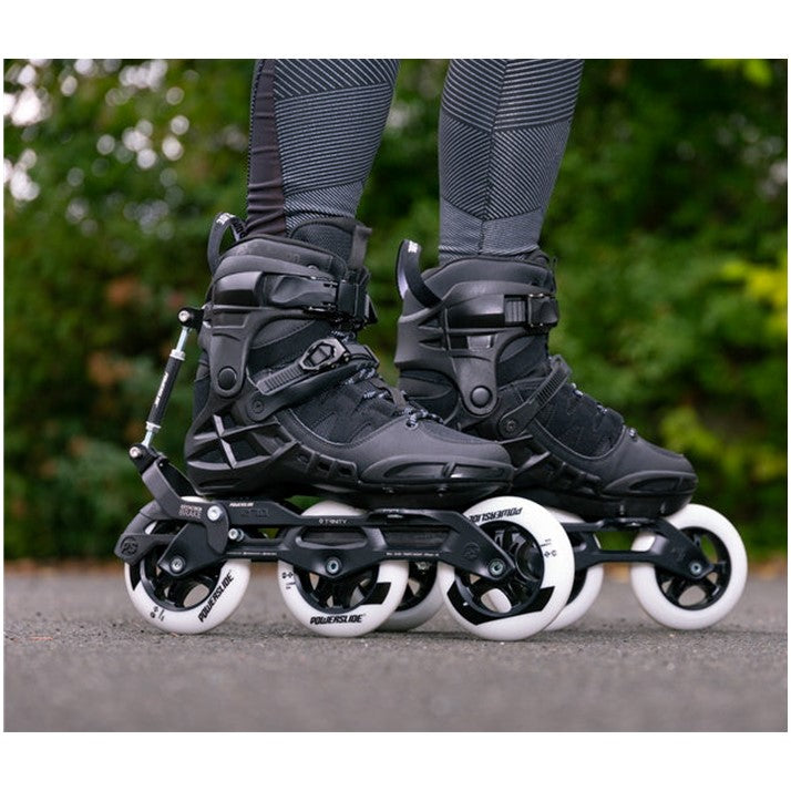 black inline skates with automatic brake and 3 white inline wheels 