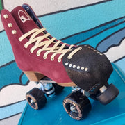 BLACK GLITTER ROLLERSTUFF TOE GUARDS ON MAROON CHUFFED ROLLER SKATES 