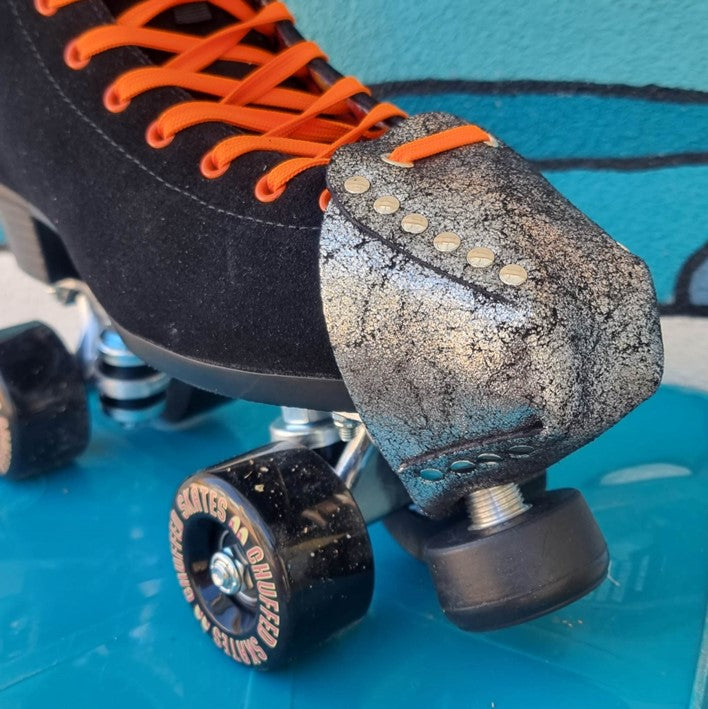 black chuffed skate with silver glitter metallic toe guard protectors with silver studs