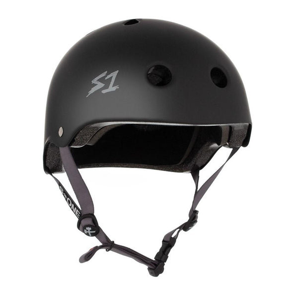 matt black helmet with grey straps and s1 text on the side