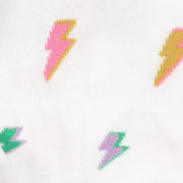 CLOSE UP OF PINK, YELLOW, GREEN, PURPLE LIGHTNING BOLTS ON WHITE SOCK