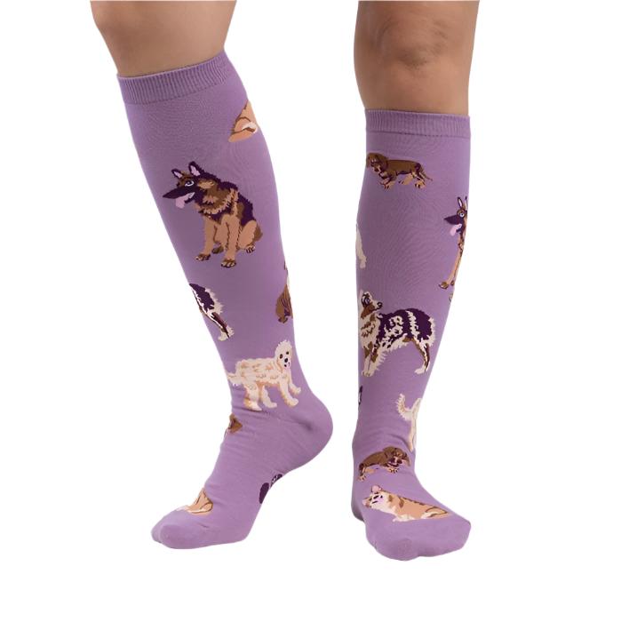 PERSON WEARING LILAC PURPLE KNEE HIGH SOCKS WITH DOG PATTERN