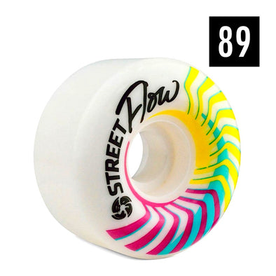 white rollerskate wheels with yellow, teal nd pink design, printed 'Street Flow'