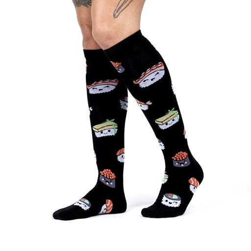 PERSON WEARNIG BLACK KNEE HIGH SOCKS WITH SUSHI PATTERN