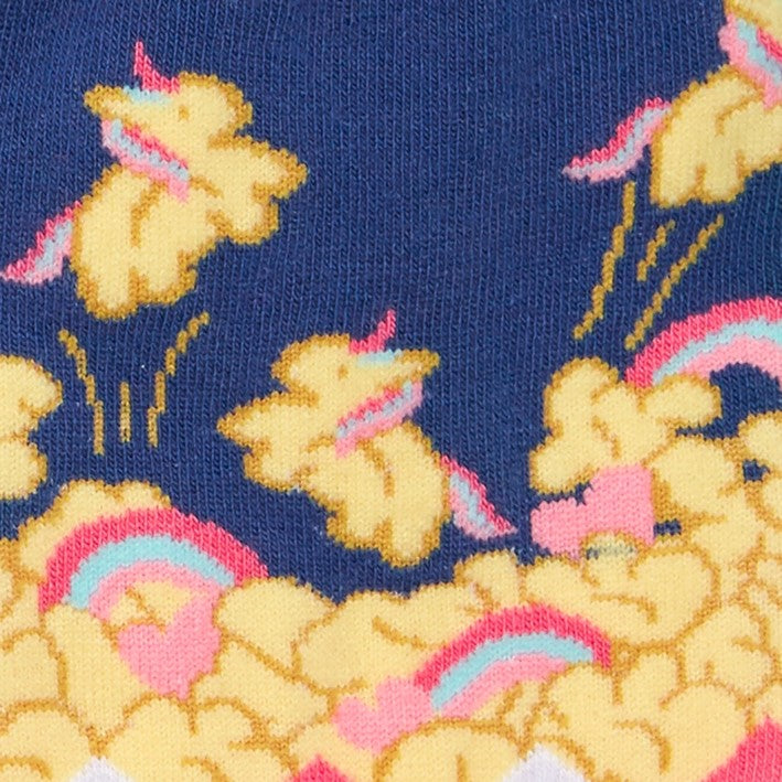 CLOSE UP OF UNICORNS AS PEICES OF POPCORN PATTERN ON SOCK