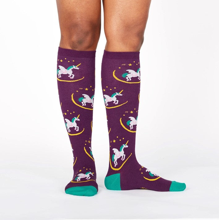 PERSON WEARING PURPLE KNEE HIGH SOCKS WITH PEGASUS PATTERN