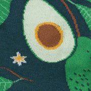 CLOSE UP OF GREEN KNEE HIGH SOCKS WITH AVACADO PATTERN