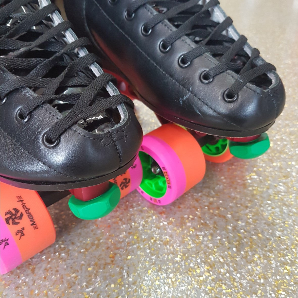 skate with green bionic jam plugs in plate 