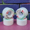 white outdoor roller skate wheels with pastel zig zag design 