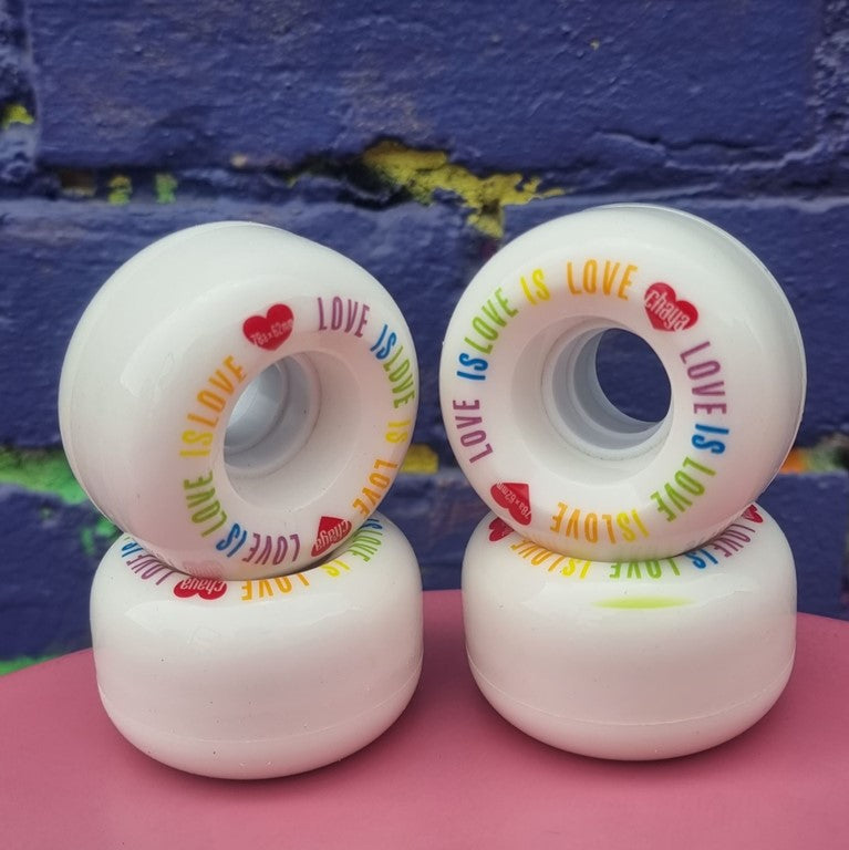 chaya white 62mm 78a outdoor roller skate wheels with 'love is love' rainbow colours on print 4 pack