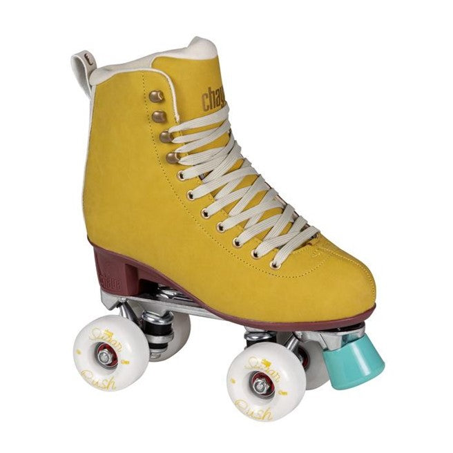 chaya mustard yellow high top roller skate with white outdoor wheels aqua green toe stops